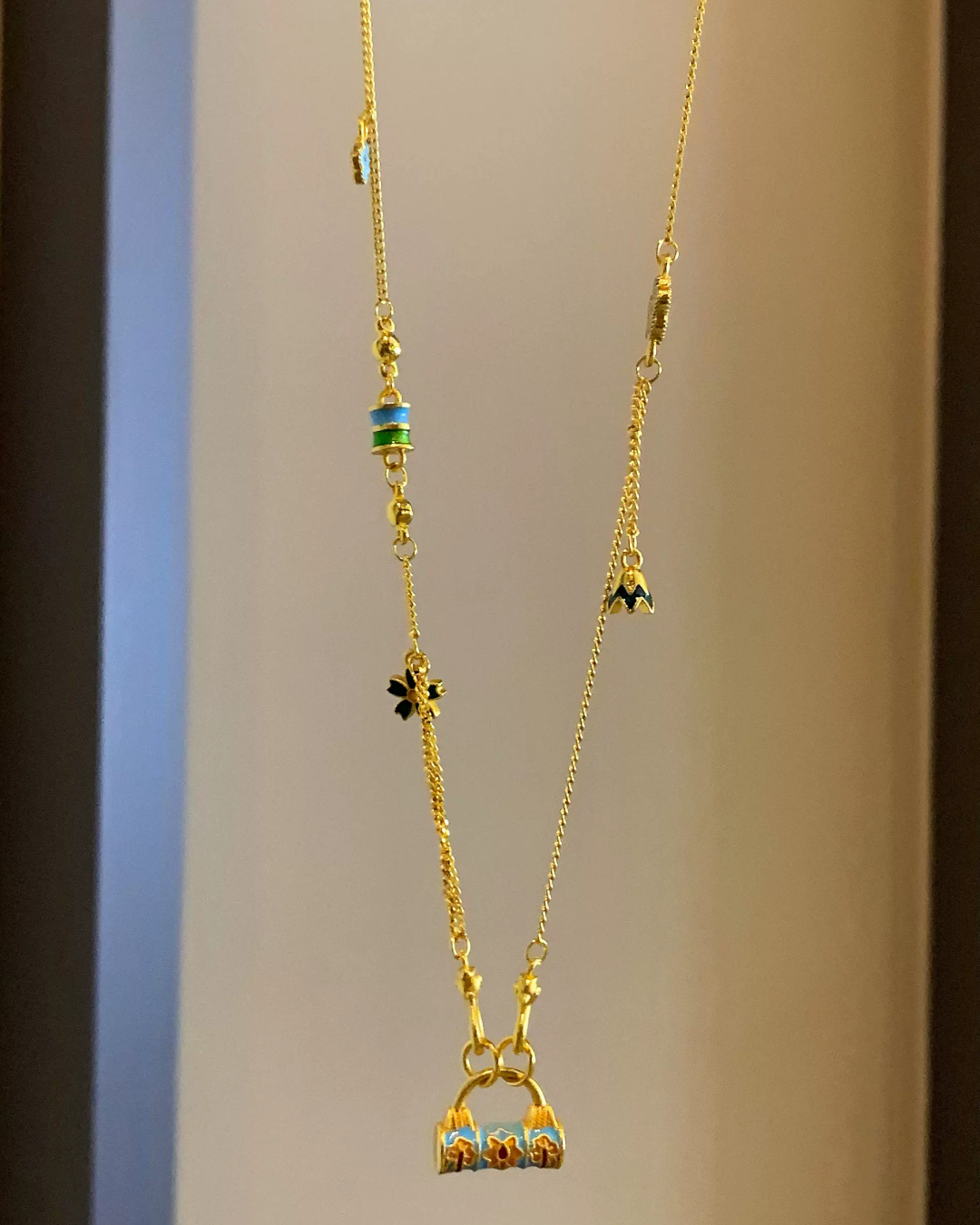 Gold Multi Charm Necklace AC0040