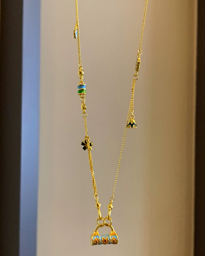 Gold Multi Charm Necklace AC0040