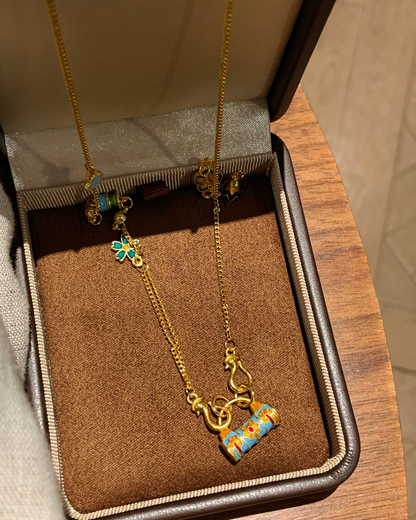 Gold Multi Charm Necklace AC0040