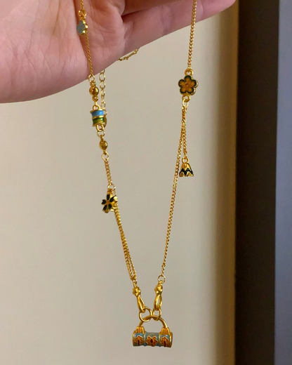 Gold Multi Charm Necklace AC0040